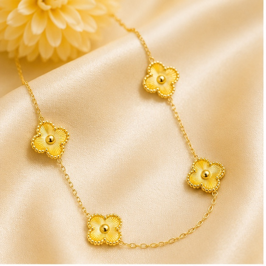 Gold four leaf clover flower necklace for women in anti tarnish stainless steel.